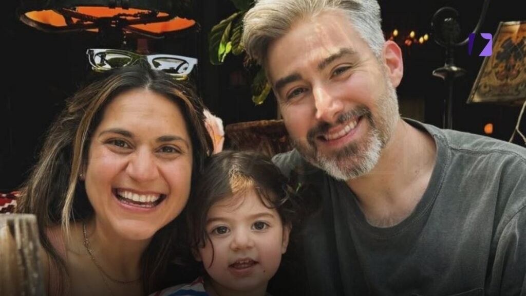 Casey Jost And Lisa Kleinman With Daughter