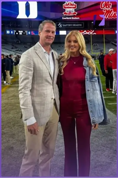 with Father Lane Kiffin